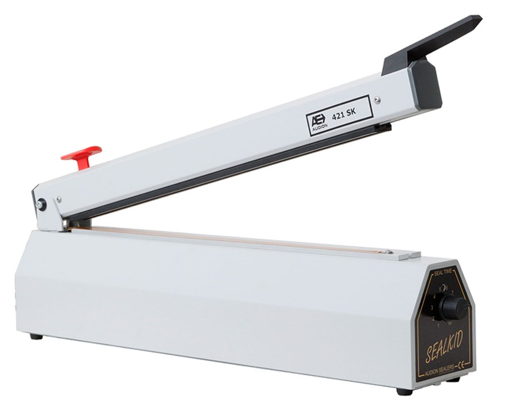 Audion Sealkid hand impulse bar sealer with the arm raised over the PTFE-covered sealing bar, pictured as the 421 SK