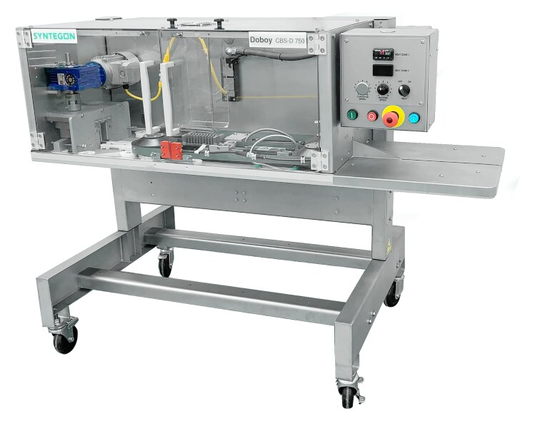 Doboy CBS-D 750 continuous band sealer on a wheeled stand, sealing section open to the band path, control box and outfeed shelf on the right