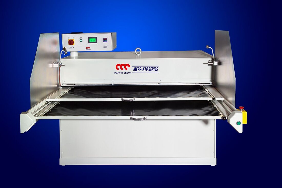 Martin Group MEPP membrane pressure fusing press with the working plane drawn out at the front and the MEPP-XTP SERIES badge across the head