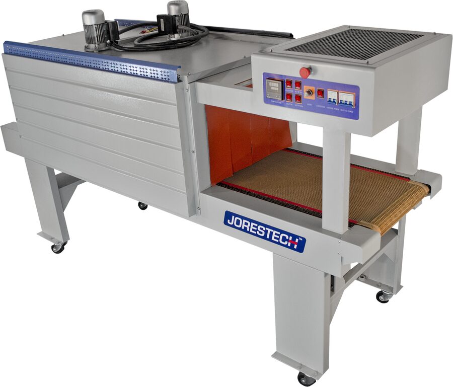 Technopack E-TUN-5540 shrink tunnel, the open-weave PTFE mesh belt running out under the cooling fan hood